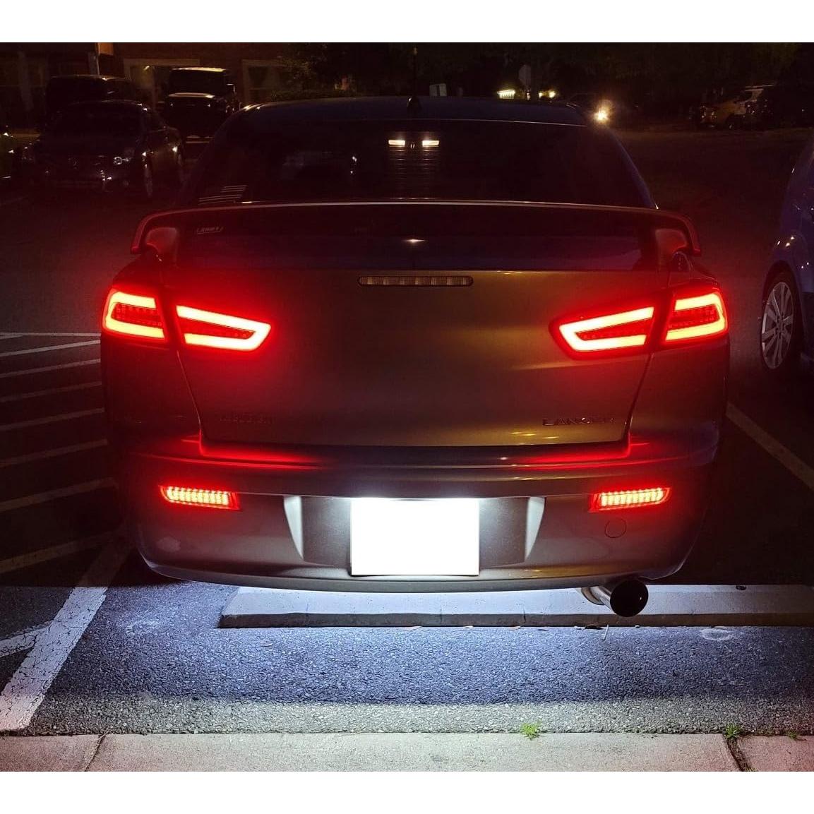 Luces Reflectoras LED Parachoques iJDMTOY Ahumadas para Mitsubishi