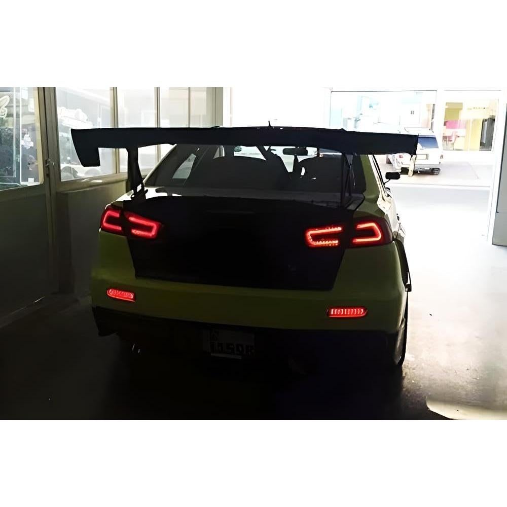Luces Reflectoras LED Parachoques iJDMTOY Ahumadas para Mitsubishi