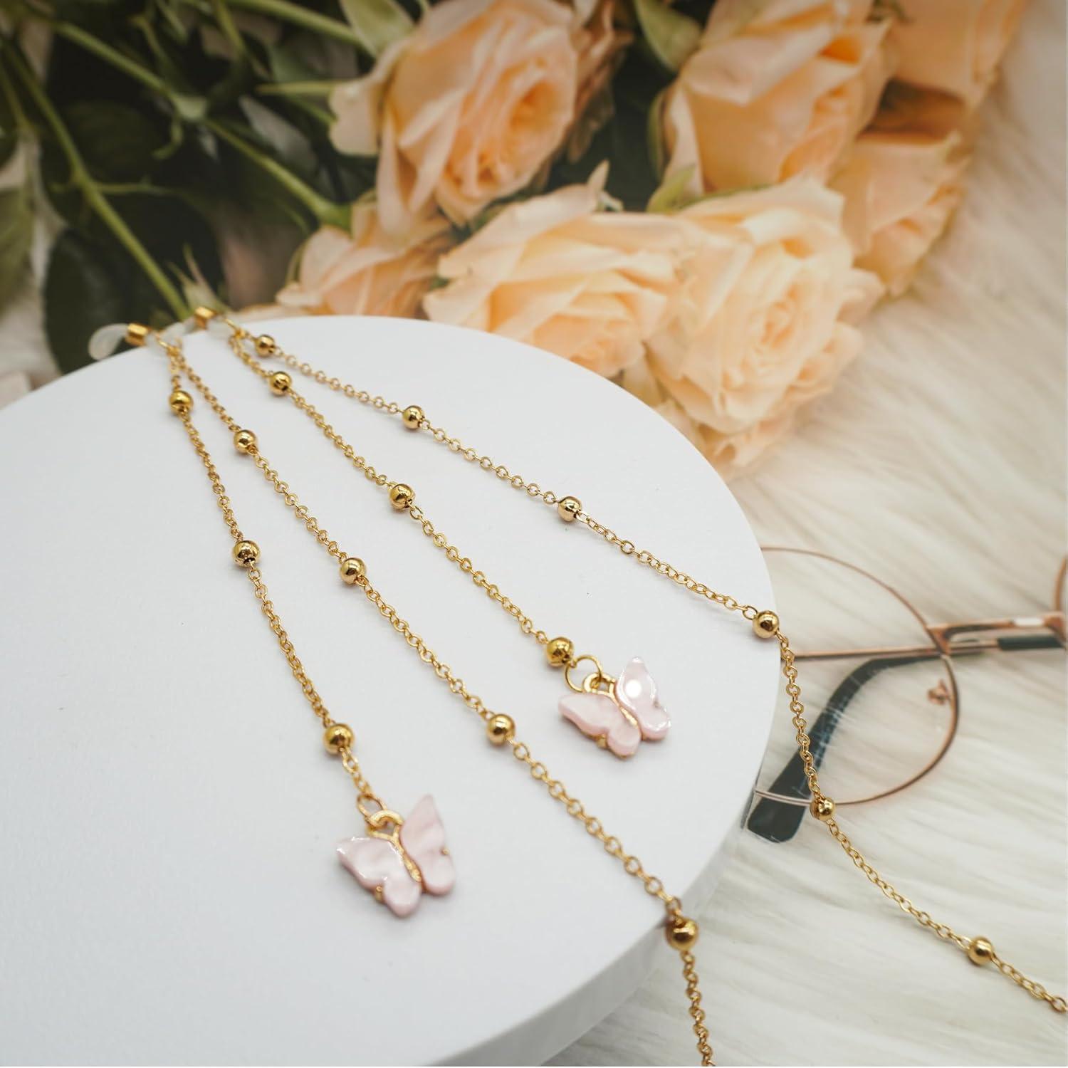 Cadena de Gafas Rosa con Mariposa y Perlas Doradas