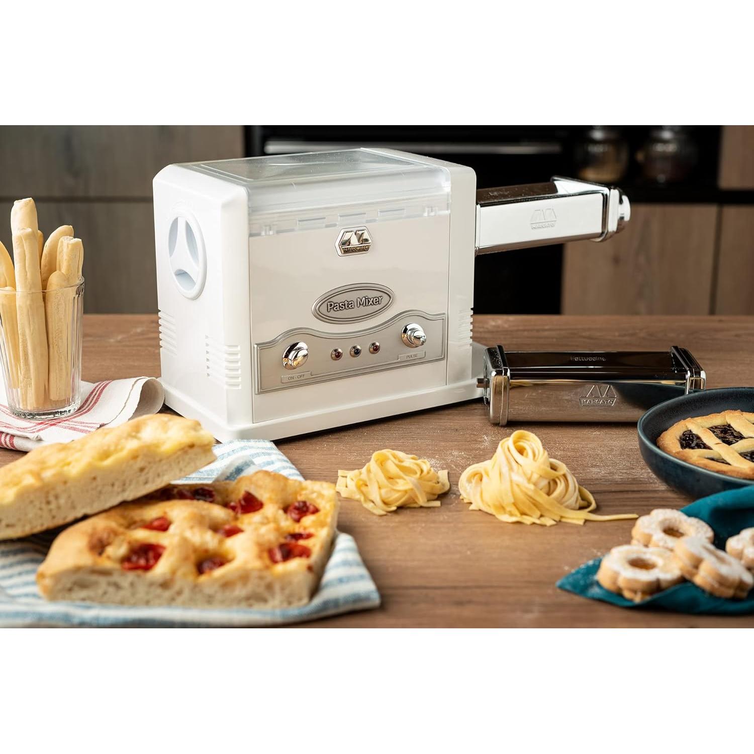Made in Italy Pasta Fresca 110V Electric Kneading & Pasta Machine. Includes lasagna, fettuccine, tagliolini attachments. Kneads bread dough, pizza dough, shortcrust pastry, 31 x 16 x 21 cm