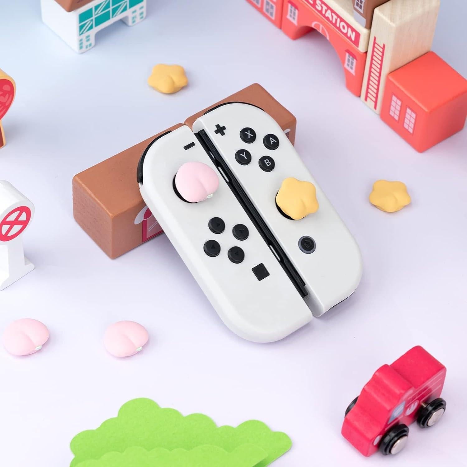 GeekShare Cute Silicone Joy Con Thumb Grip Caps, Joystick Cover Compatible with Switch/OLED/Switch Lite,4PCS - Peach & Star