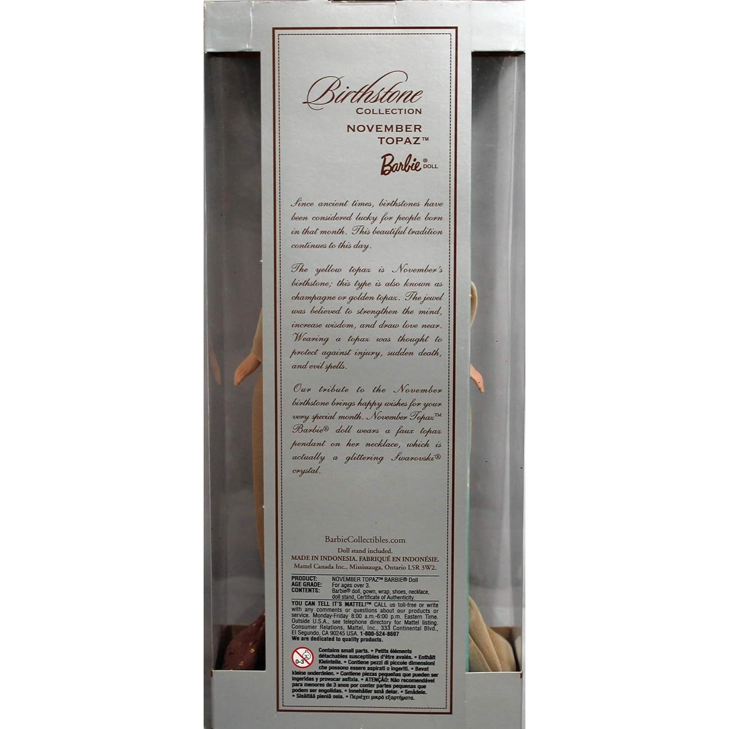 Muñeca Barbie Topacio Noviembre 2002 con vestido brillante
