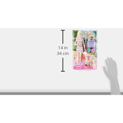 Muñeca Barbie con cachorro y perro en silla de ruedas