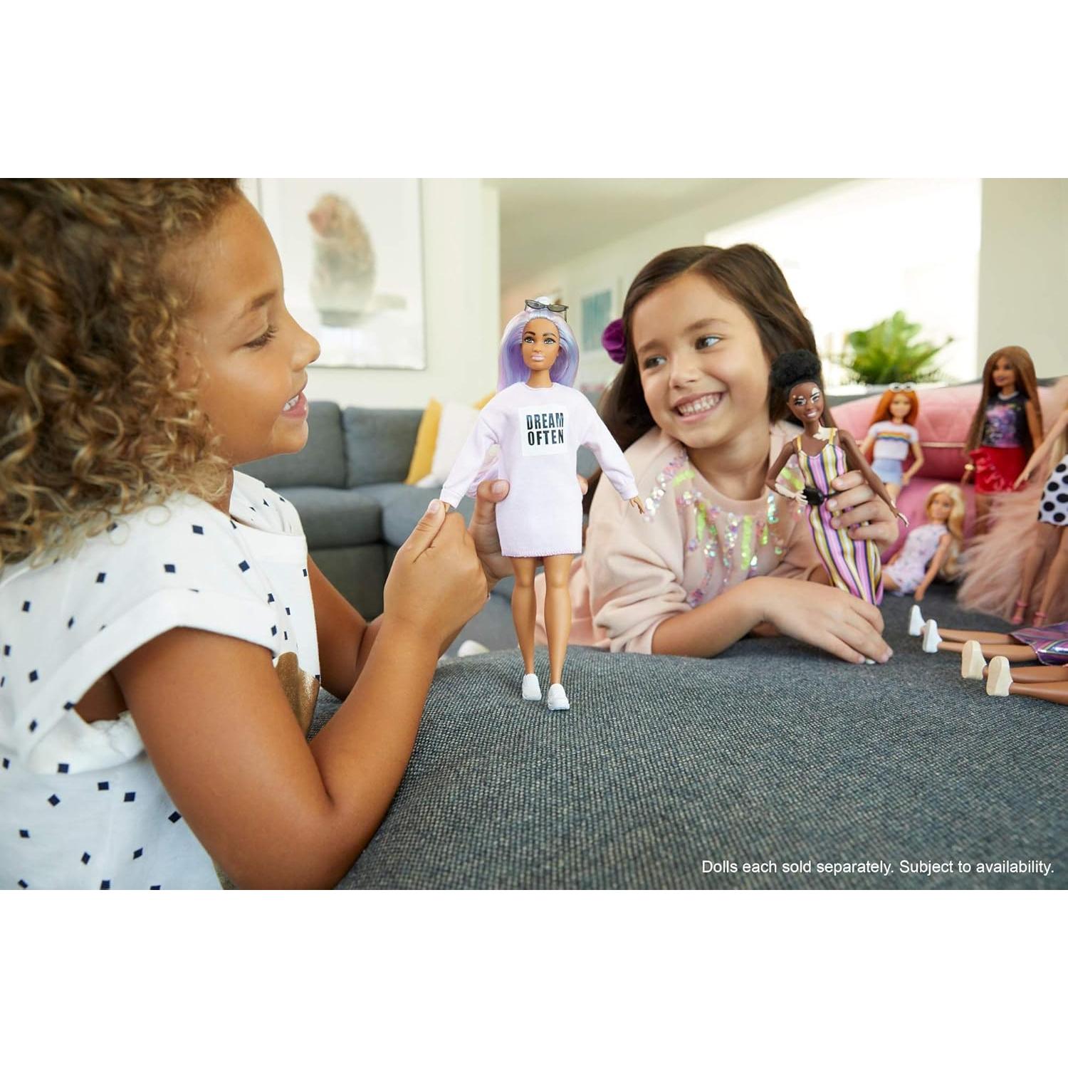 Fashionistas Doll with Long Rainbow Hair Wearing Sweatshirt Dress and Accessories, for 3 to 8 Year Olds​