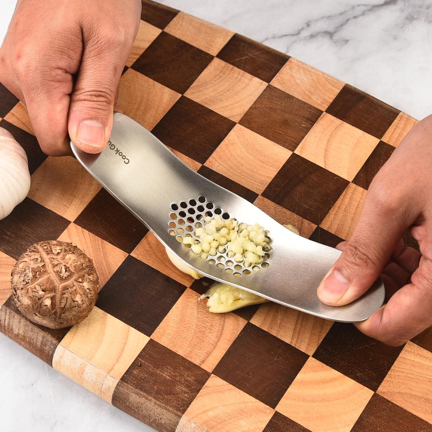 Prensa de Ajo Rocker Acero Inoxidable 304 con Pelador y Raspador