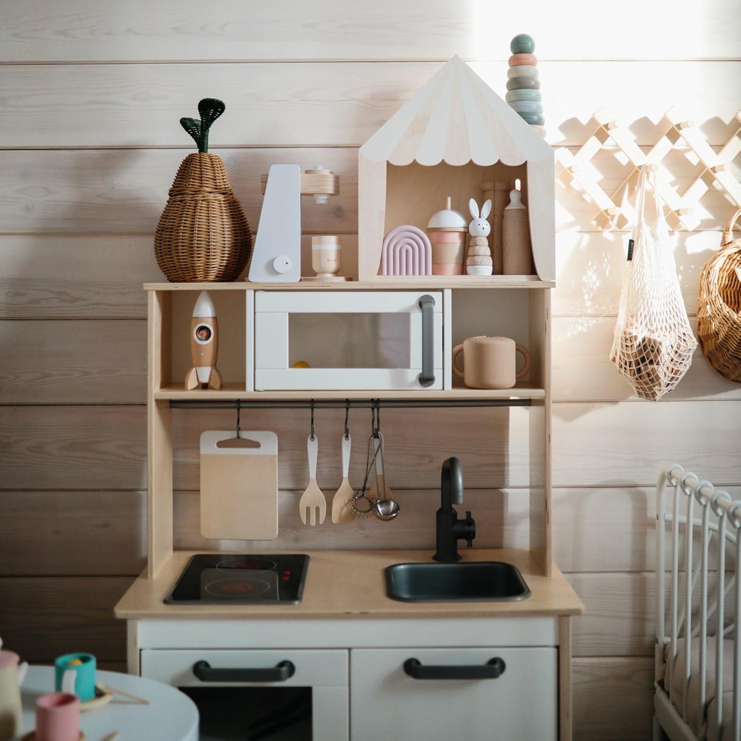 Juguete apilable Mushie anillos rústicos 10x8x9 cm